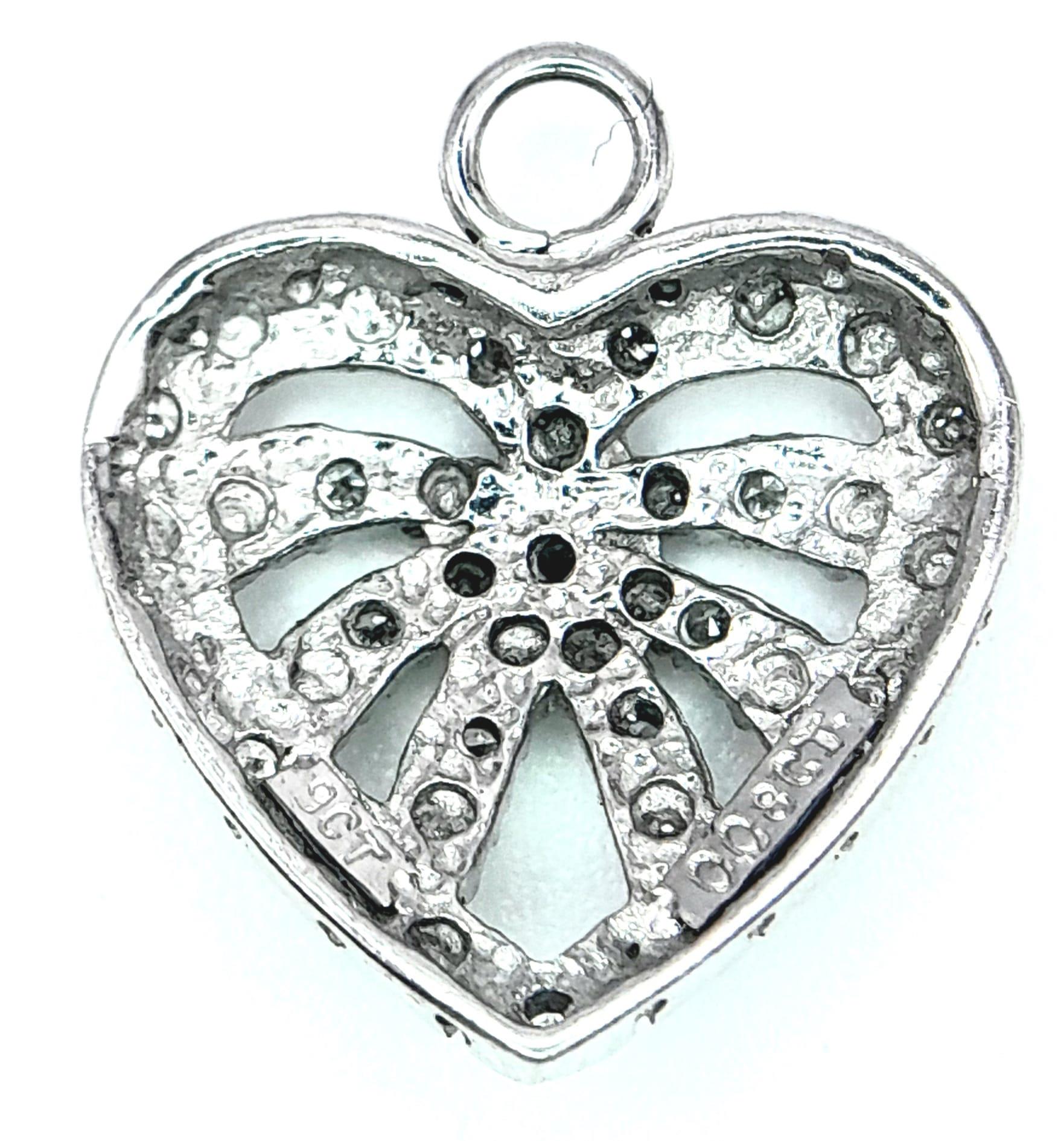 A 9K White Gold Diamond Set Heart Pendant/Charm. 1.7cm length, 1.3g total weight. Ref: 8413 - Image 3 of 7