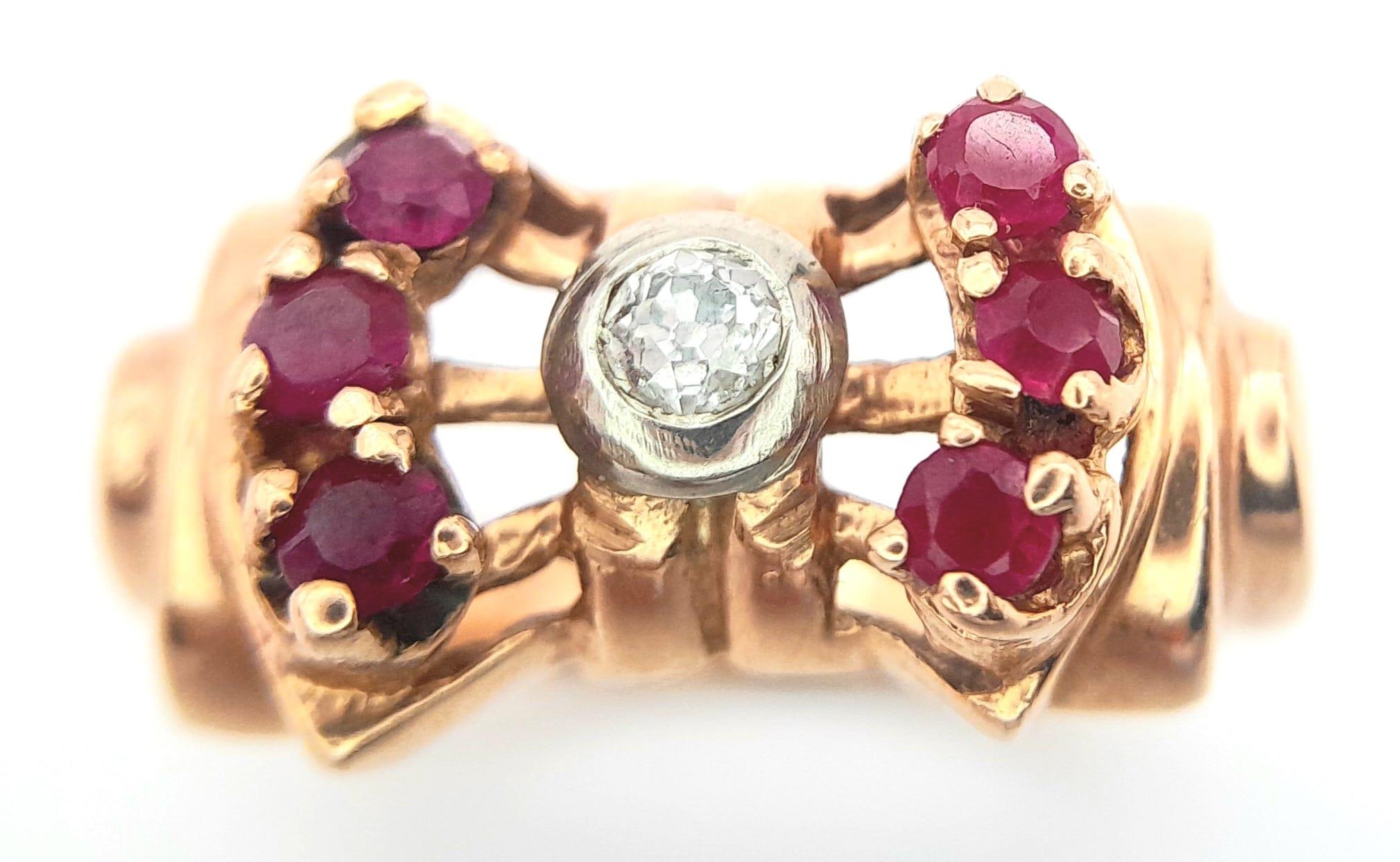 A 14K ROSE GOLD DESIGNER RING WITH CENTRAL DIAMOND FLANKED BY RUBIES . 8.1gms size L - Image 4 of 7