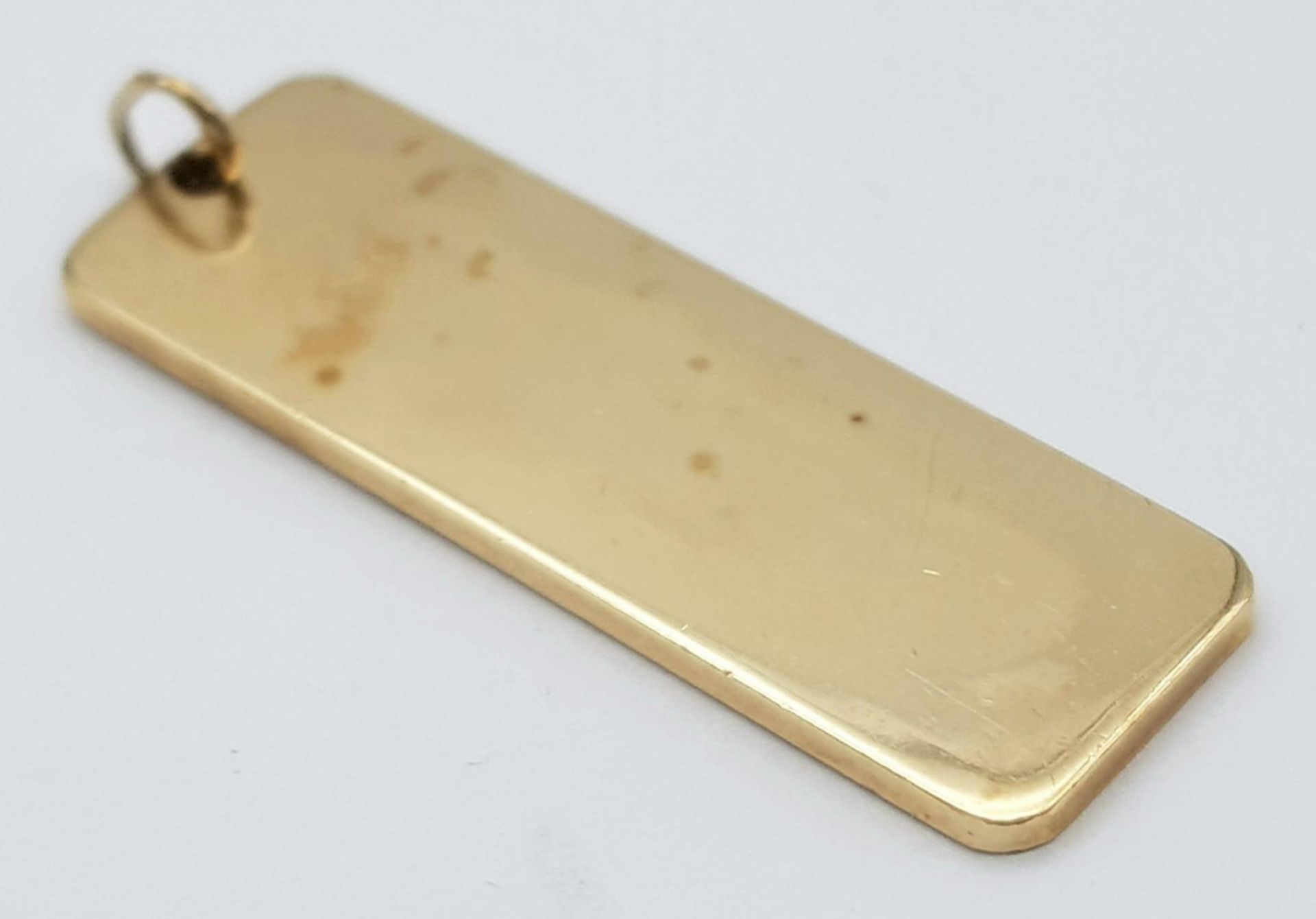 A 9K Yellow Gold Hallmarked Ingot Pendant. 7.8g weight. - Image 2 of 3