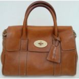 A Mulberry Small Bayswater Satchel. Oak coloured textured exterior with gold tone hardware.