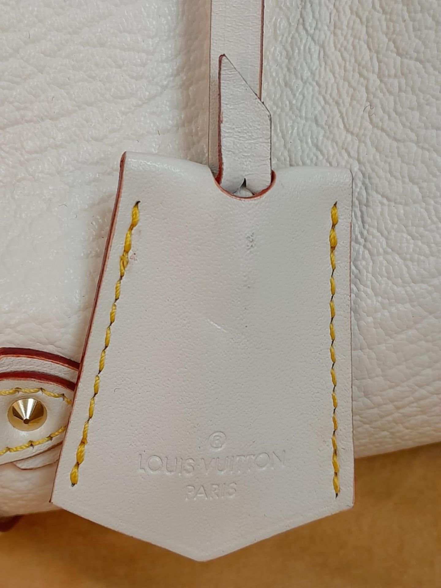 A Louis Vuitton Manhattan PM Suhali Leather Handbag. Soft white textured leather exterior with - Image 7 of 9