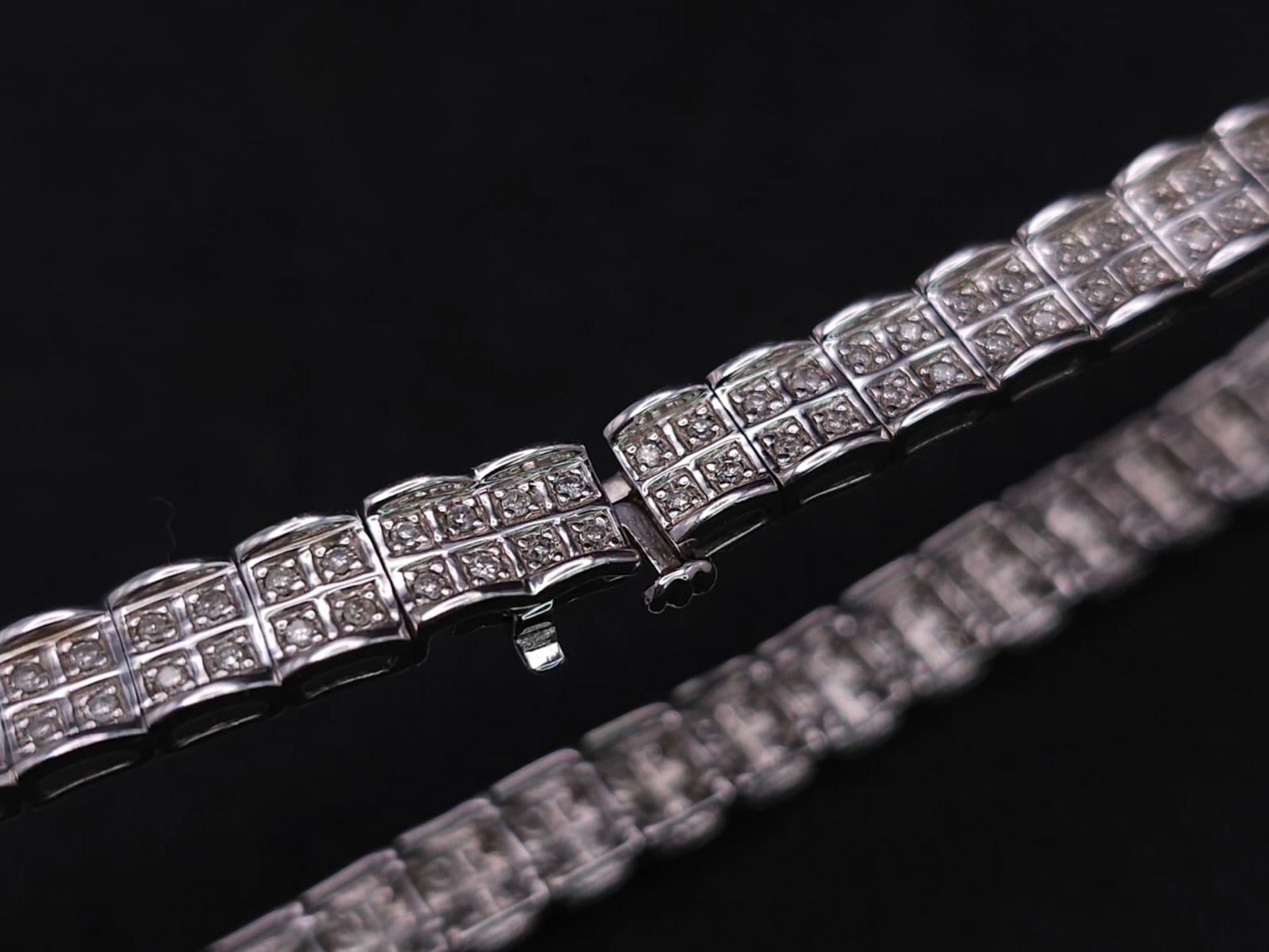 A 9K White Gold Diamond Set Bracelet, with Under Safety Catch Fitting. 1ctw, 19cm length, 12.7g - Image 10 of 14