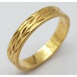 An 18K Yellow Gold Band Ring. 3mm width. Size H. 2.4g weight.