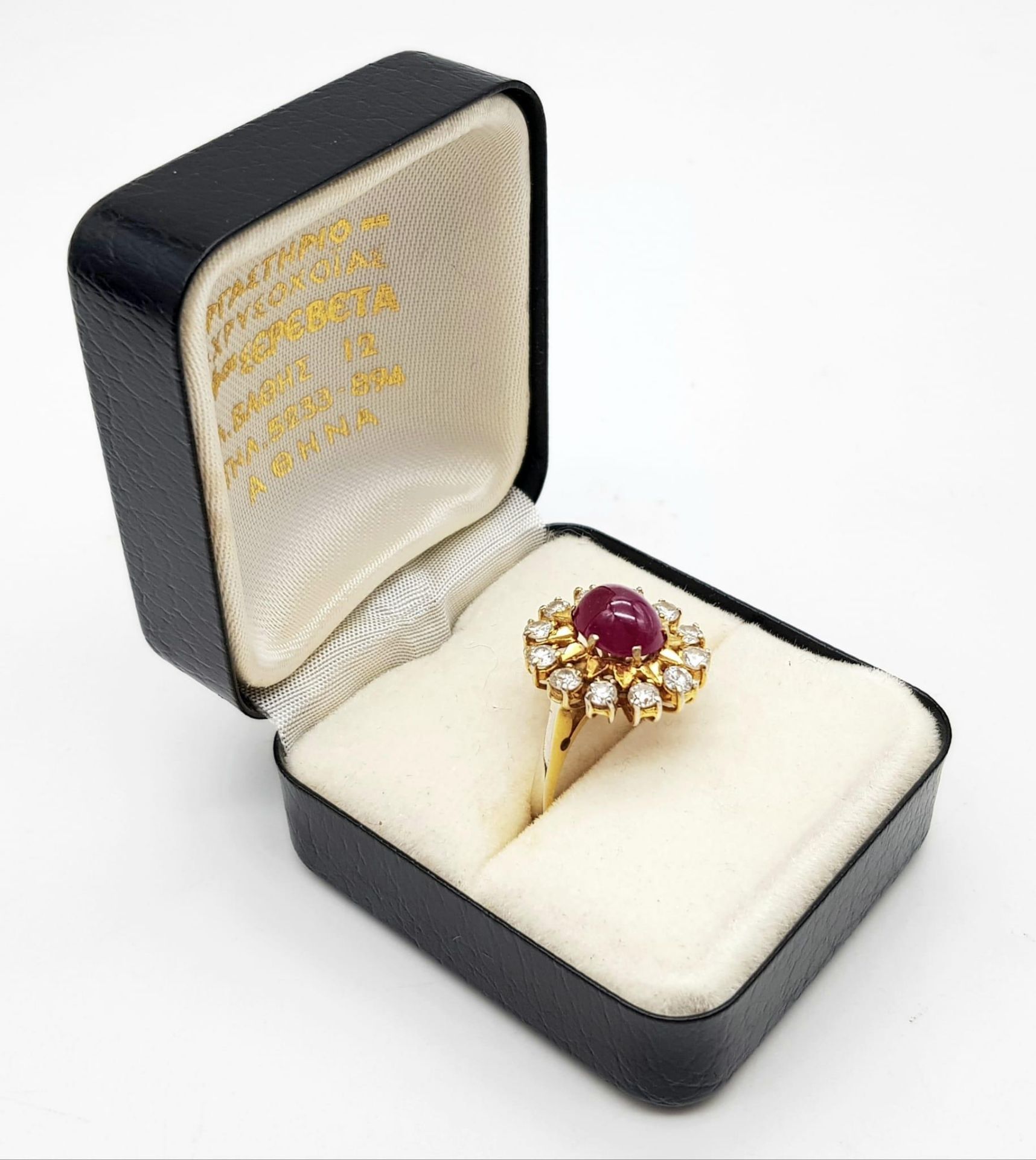 An 18K Gold (tested) Ruby and Diamond Ring. A 1.5ct high-grade ruby cabochon with a brilliant cut 12 - Image 4 of 6