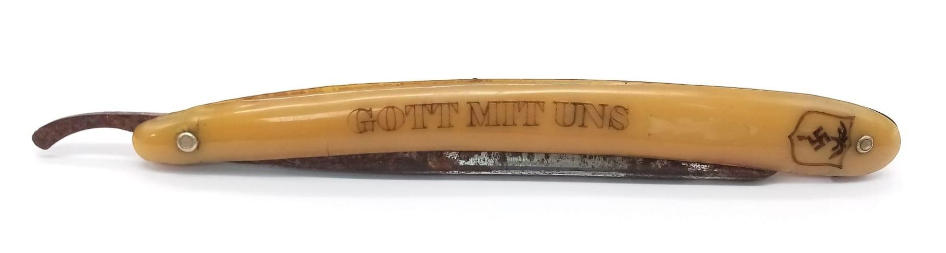 WW2 German Africa Corps Patriotic Cut-throat Razor. There is a small chip in the blade.