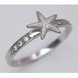 An 18K White Gold Theo Fennell Starfish Diamond Set Ring. Size N, 4.8g total weight. Ref: SC 7064