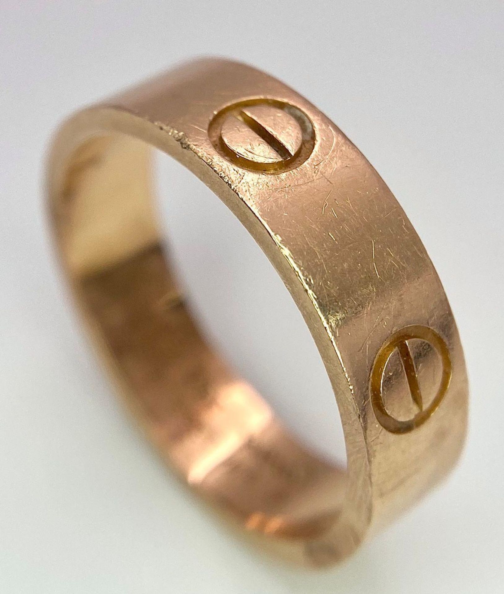 A Cartier 18K Rose Gold Love Band Gents Ring. 6mm width. Cartier hallmarks. Size W. 8.6g weight. - Image 5 of 9