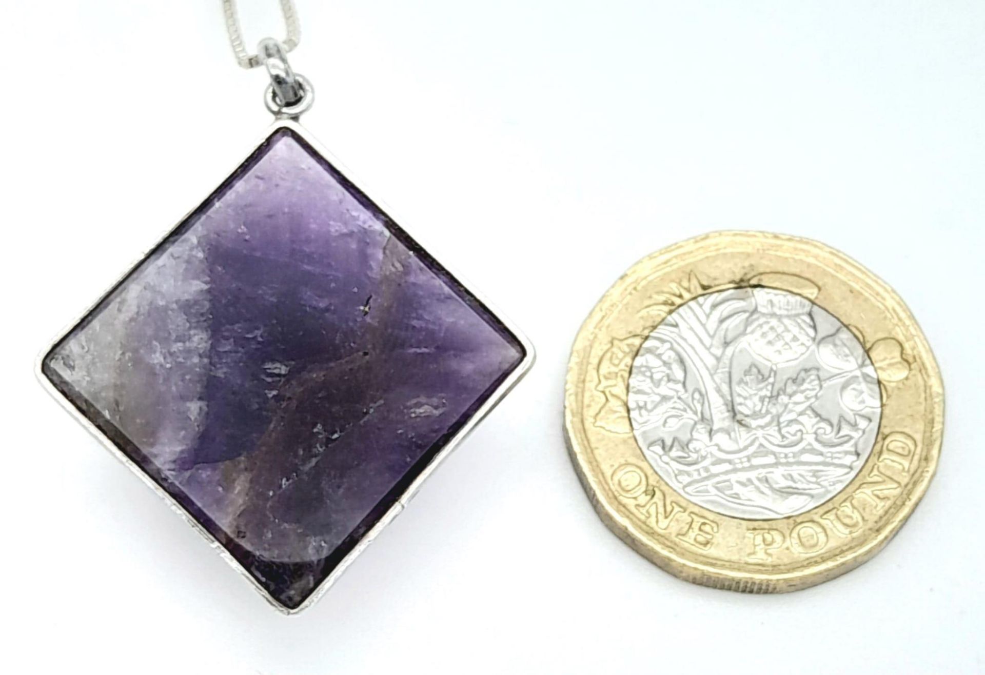 A Sterling Silver Pyramid Cut Amethyst Pendant Necklace. 37cm Length. Amethyst Measures 2cm Width. - Image 6 of 10