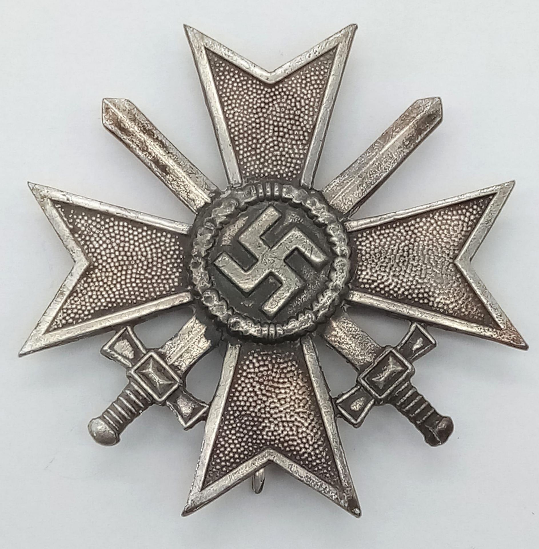 3rd Reich German War Merit Cross First Class with Swords, die-struck construction in zinc with