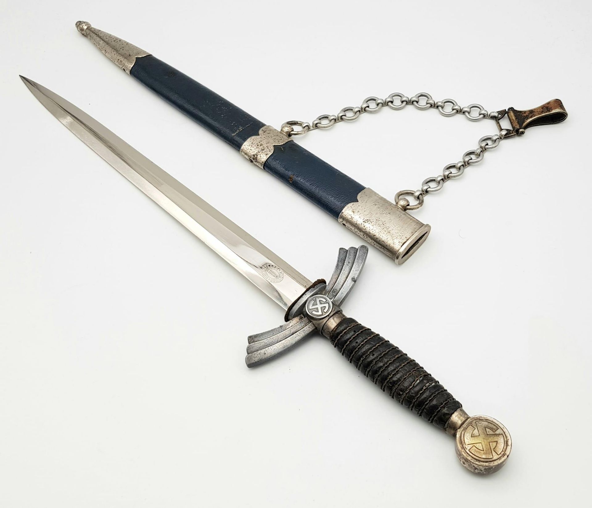 A Blue Luftwaffe Dagger - 1st Model by FW Holler. The mounts and hilt are solid nickel. The sun-