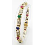 A GORGEOUS 18K YELLOW GOLD DIAMOND, SAPPHIRE, RUBY & EMERALD SET BRACELET. 1.50CTW OF ENCRUSTED