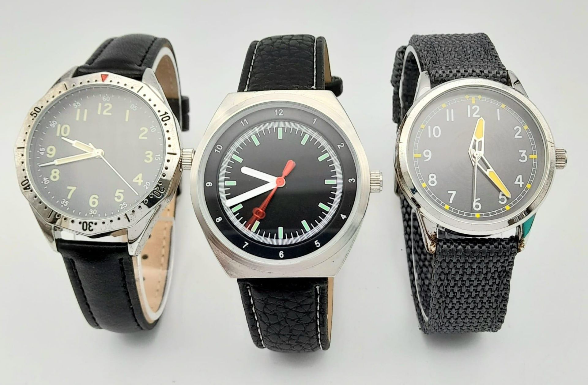 A Parcel of Three Military designed Homage Watches Comprising; 1) German Defense Force Watch (40mm