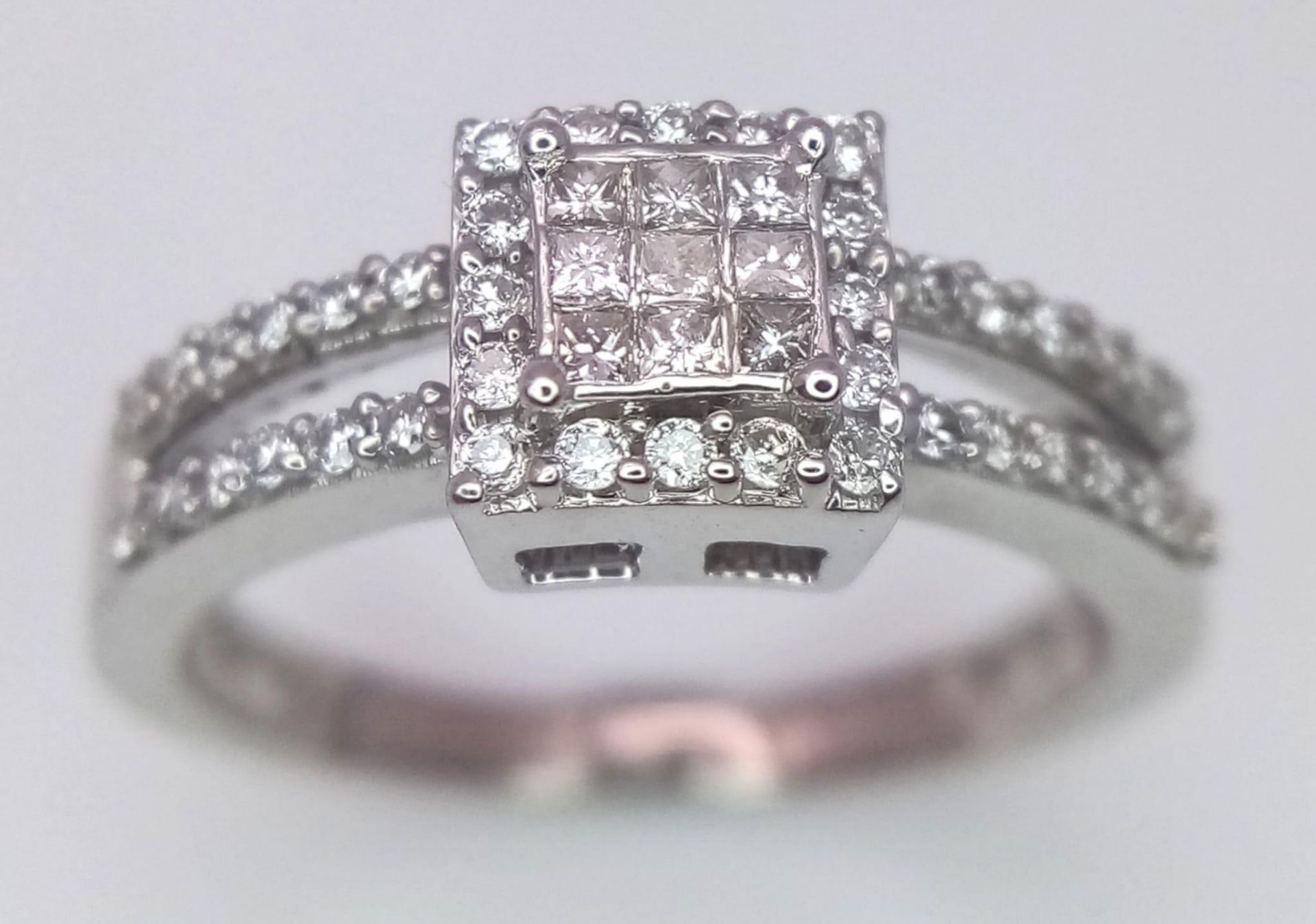 An 18K White Gold Diamond Ring. 0.33ctw, size L, 2.8g total weight. Ref: 8002