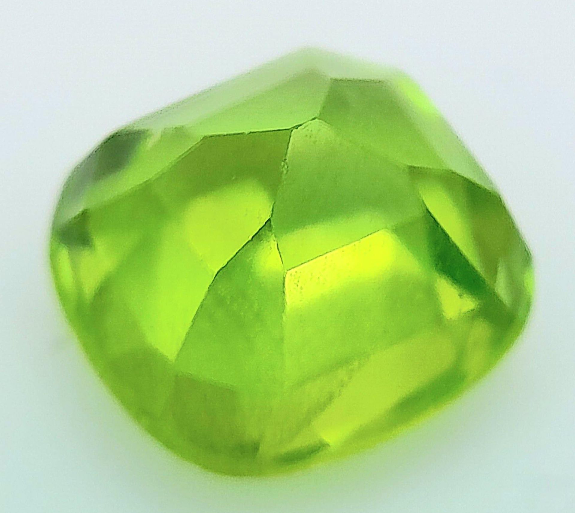 A 2.34ct Pakistan Natural Peridot Gemstone, Cushion cut. Comes with the GFCO Swiss Certificate. ref: - Image 3 of 5