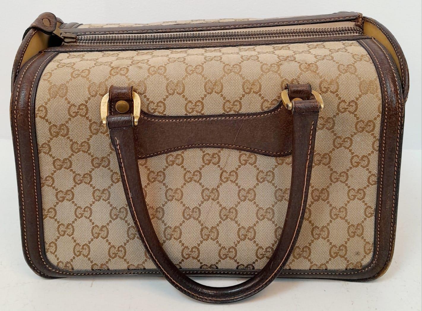 A Gucci Monogram Hard Train Vanity Case. Textile exterior with leather trim, two rolled leather - Image 3 of 7