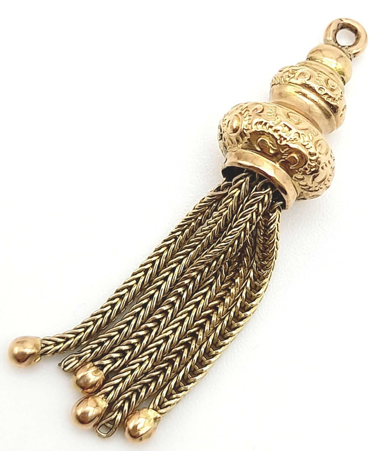 A 9k Yellow Gold Magic Tasselled Lamp Pendant/Charm. 4cm. 2g.
