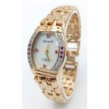 An Ingersoll Stone Set Quartz Ladies Watch. Gold plated bracelet and case - 25mm. White dial with