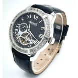 An Ingersoll Automatic Skeleton Gents Watch. Black leather strap. Stainless steel case - 43mm. Black