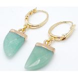 A Pair of Curved Jade Earrings.