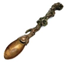 A rare antique, bronze, oriental (possibly Chinese), heavily ornate teaspoon. The handle has a