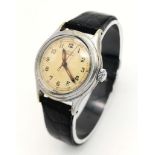 A Vintage Incarna Mechanical Gents Watch. Black leather strap. Stainless steel case - 30mm. Aged