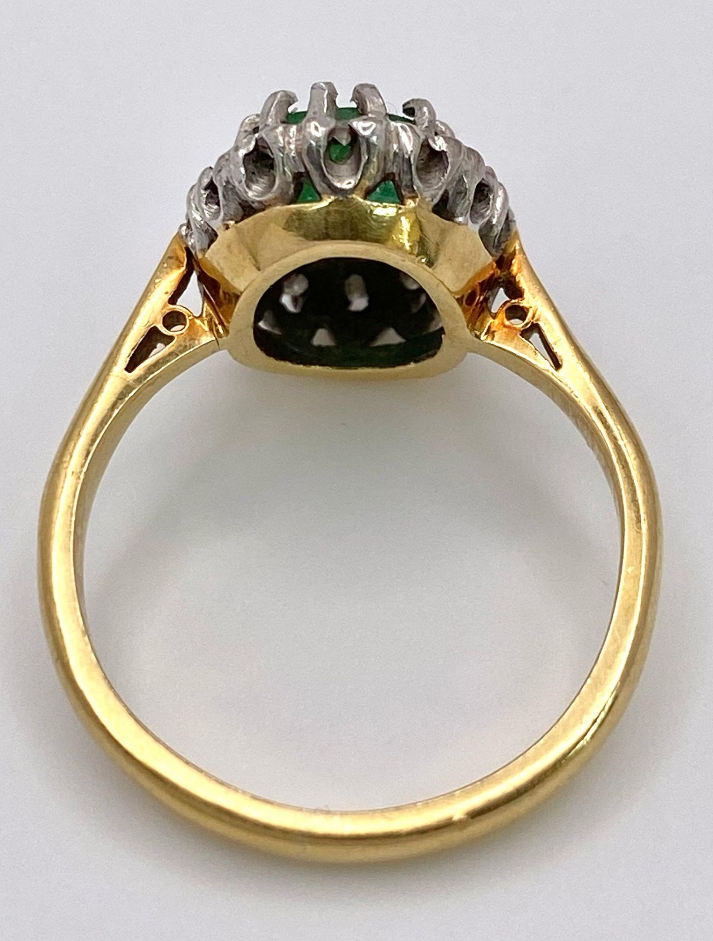 An 18K Yellow Gold, Emerald and Diamond Ring. Central 2ct emerald with a diamond surround. Size J. - Image 6 of 7