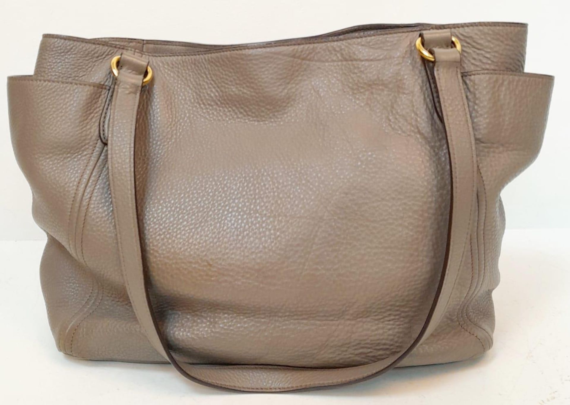 A Prada Grey Leather Shoulder Bag. Textured leather exterior with gold tone hardware. Textile and - Bild 3 aus 9