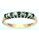 A 9K YELLOW GOLD DIAMOND & EMERALD RING - 0.12CT DIAMONDS. 2.4G. SIZE Q.