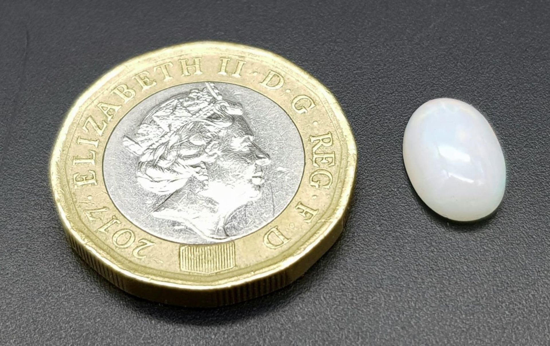 A 1.52ct Ethiopian Natural White Opal, in the Oval shape. Comes with the GFCO Certificate. ref: ZK - Image 5 of 6