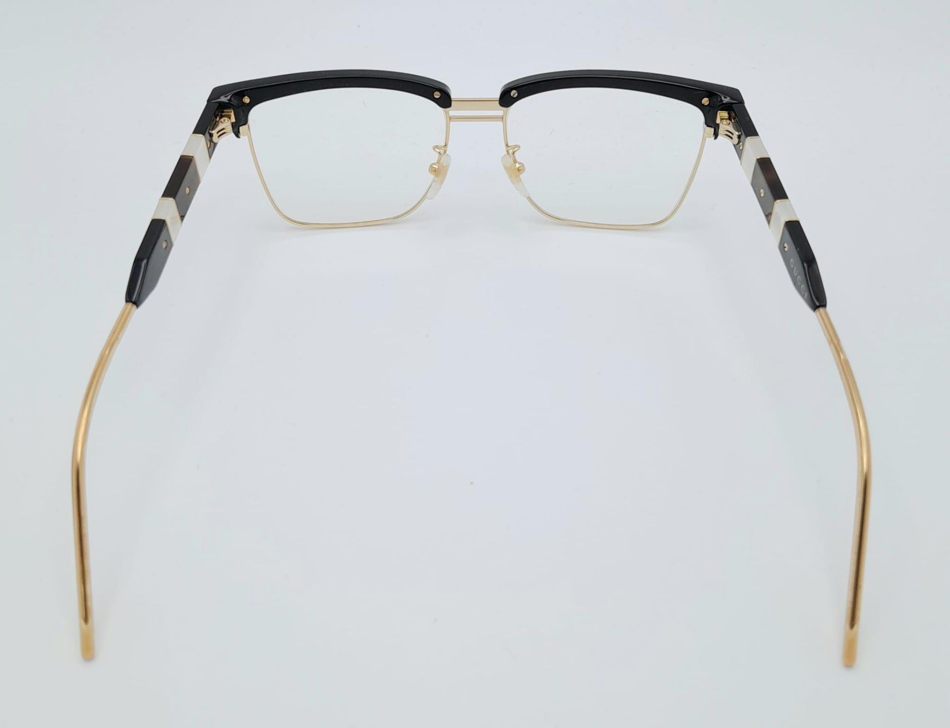 A GUCCI pair of glasses, gold plated in parts with mother of pearl highlights. Very stylish! - Image 4 of 5