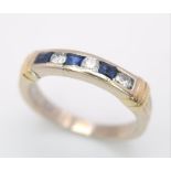 An 18 K yellow gold ring with alternating blue sapphires and diamonds. Size: K, weight: 3.2 g.