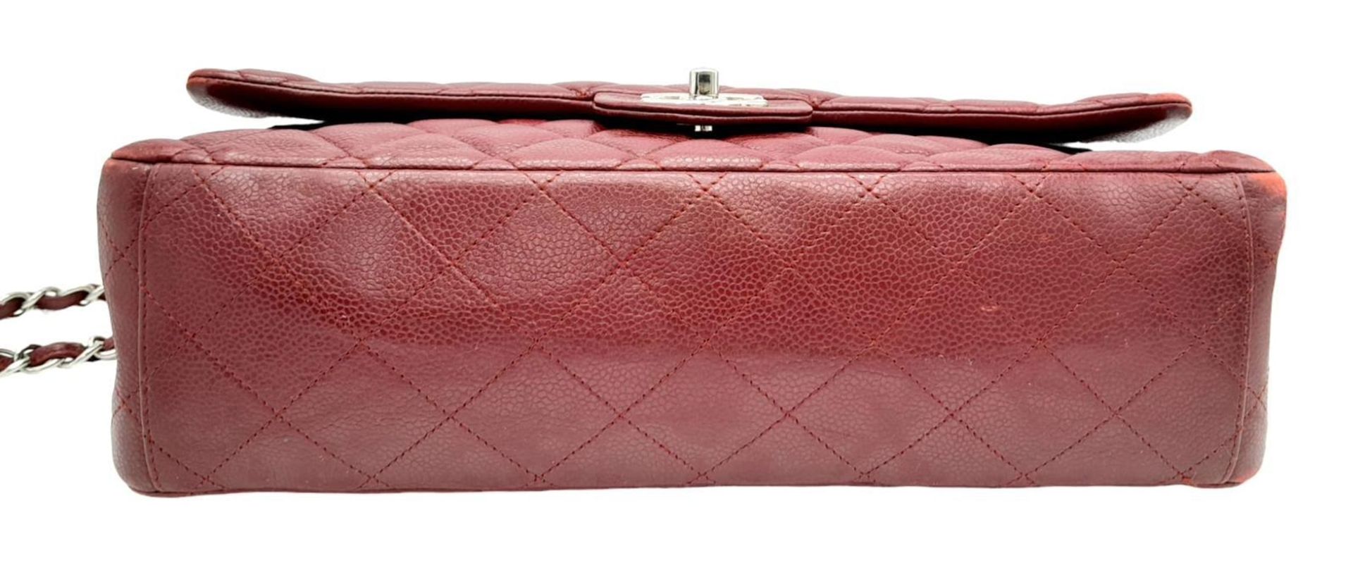 A Chanel Burgundy Jumbo Classic Double Flap Bag. Quilted leather exterior with silver-toned - Bild 3 aus 16