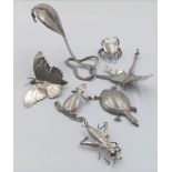 An interesting collection of hand crafted white metal animals and insects such as crab, snake,