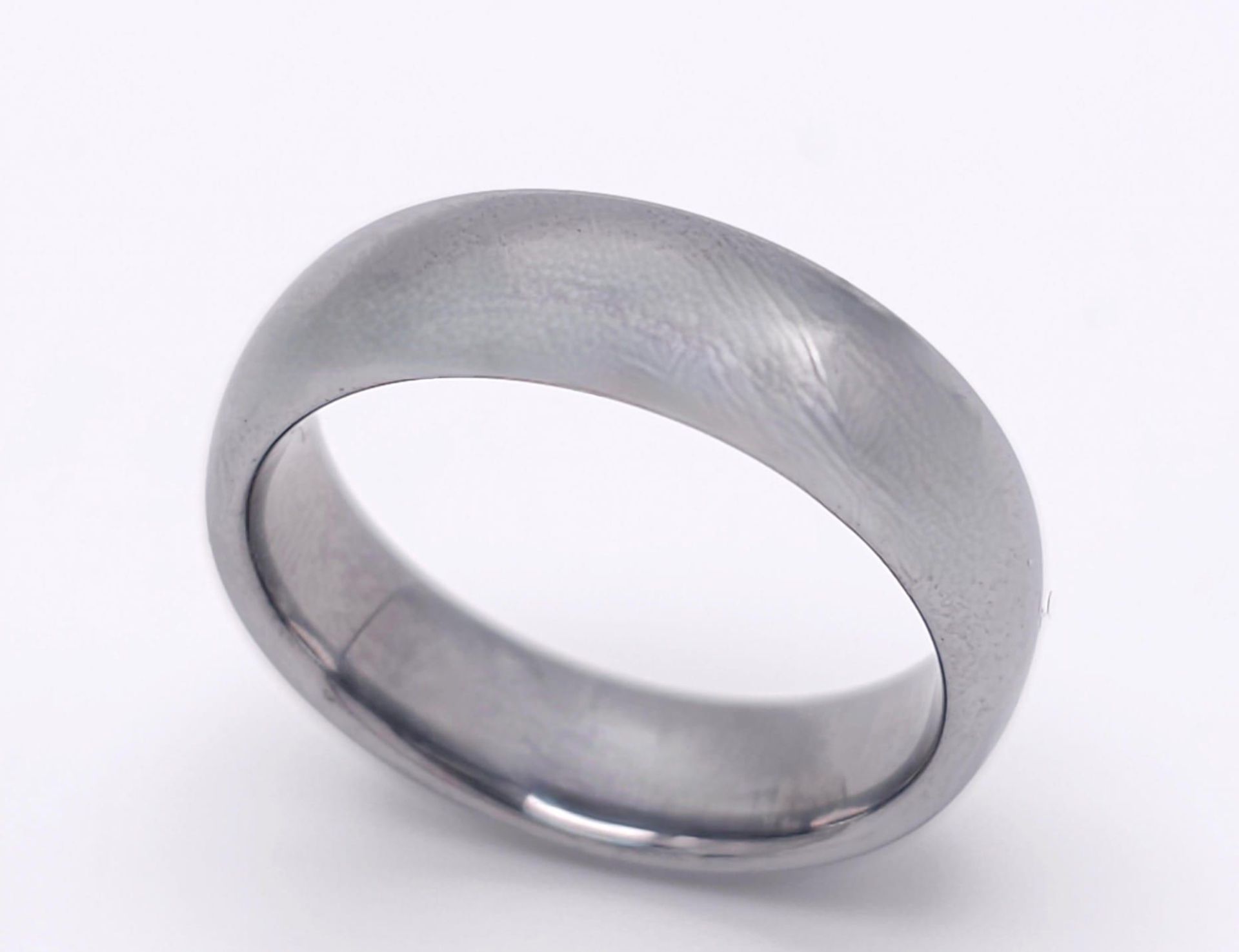 A Tungsten Band Ring. 6mm width, Size Q. 10.5g