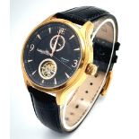 An Earnshaw 23 Jewels Automatic Watch. Black leather strap. Gilded case - 43mm. Black dial with