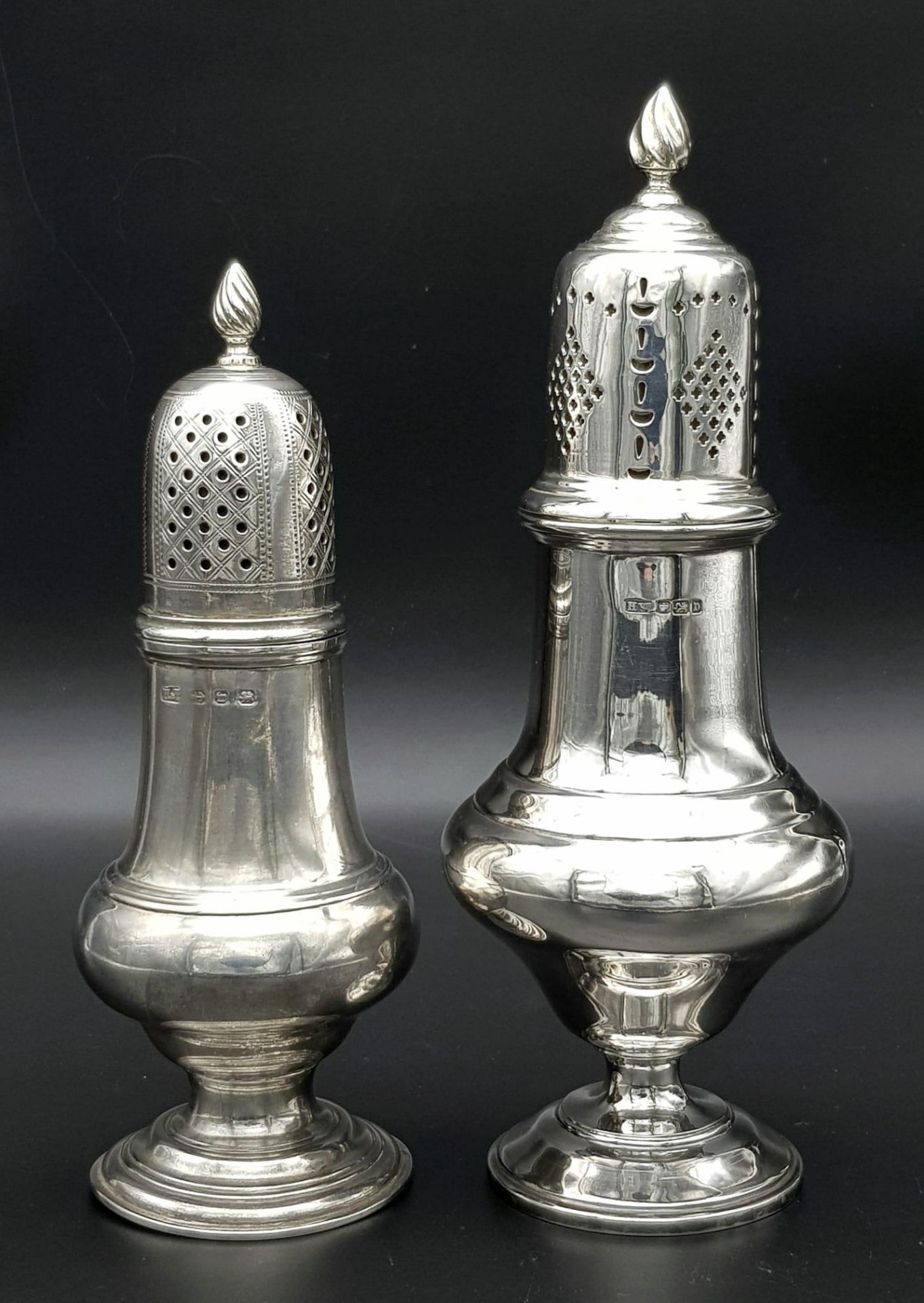 2X antique sterling silver sugar casters with different sizes. The big one come with full