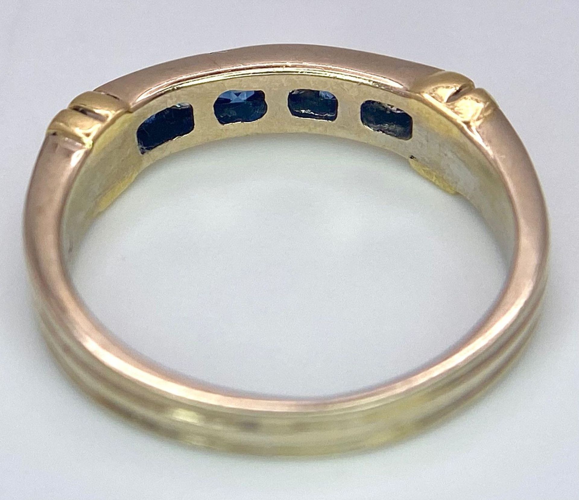 An 18 K yellow gold ring with alternating blue sapphires and diamonds. Size: K, weight: 3.2 g. - Image 12 of 13