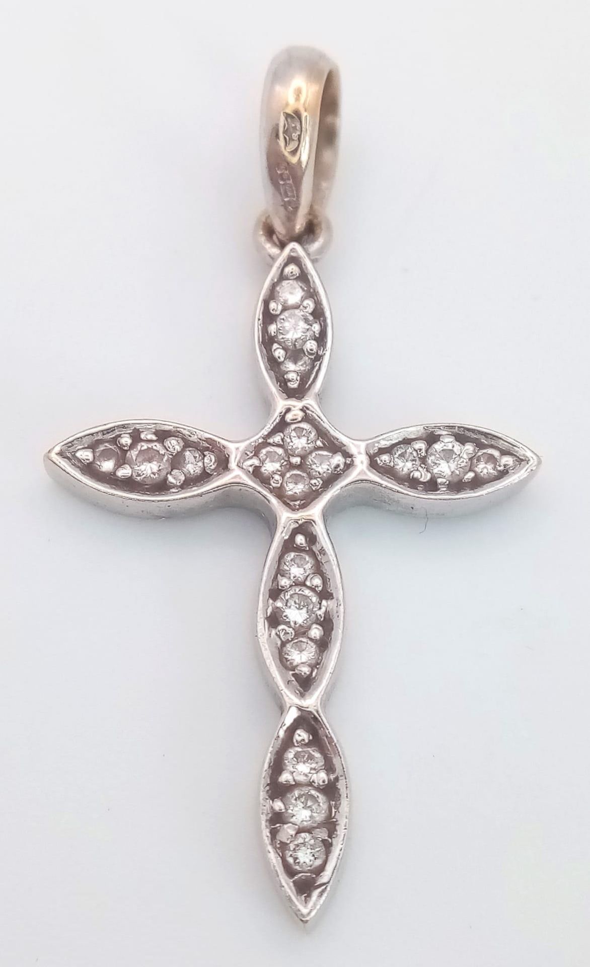 An 18K 2 Colour Diamond Set Cross Pendant. 3.2cm length, 2.7g total weight. Ref: SC 7078