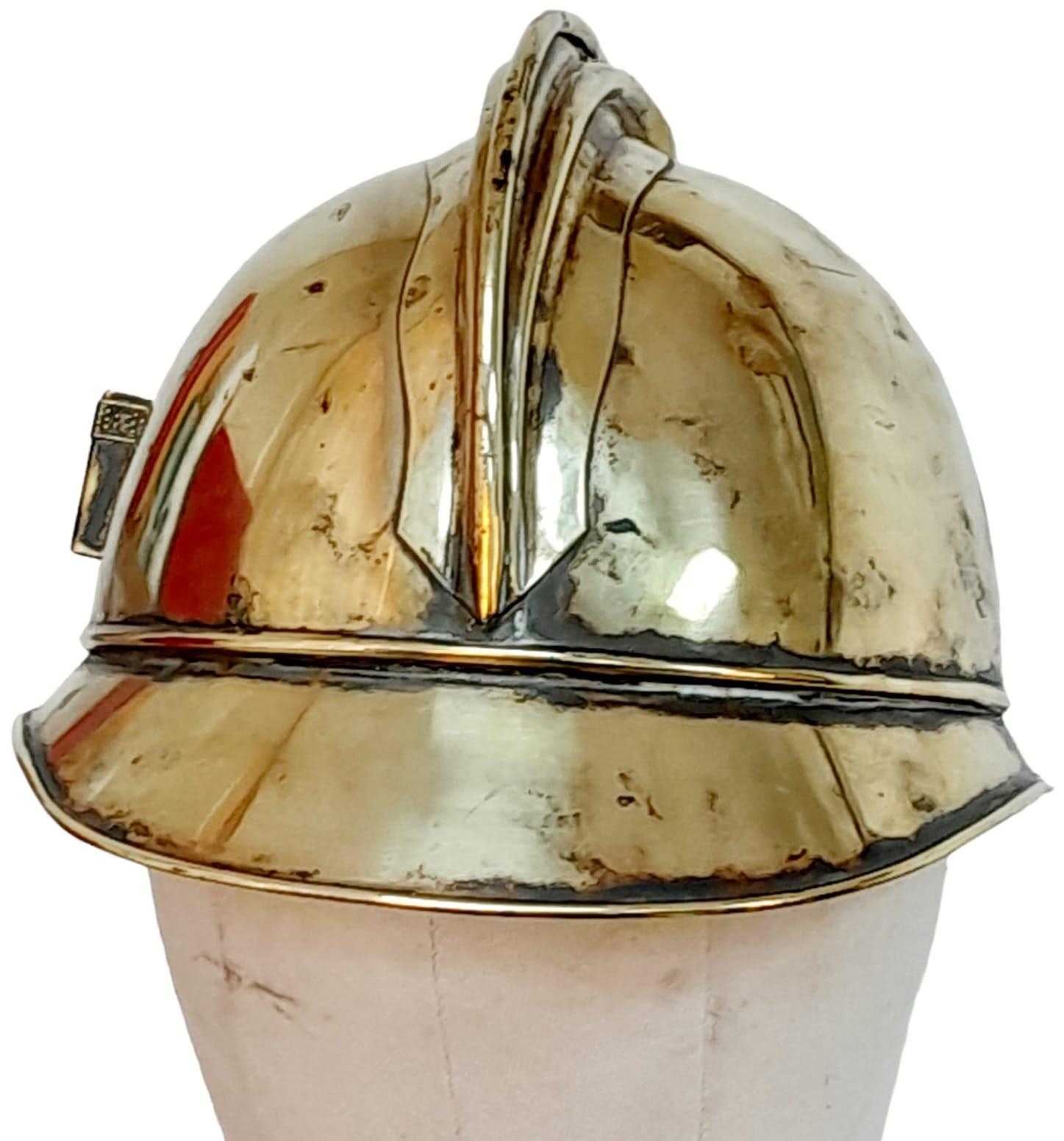 A Late 19th Century French Fireman's Brass Ornate Helmet. With original liner. - Image 3 of 4