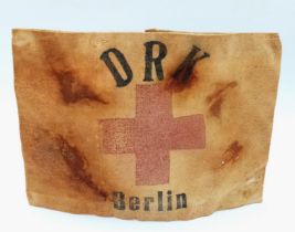 WW2 German Red Cross Armband-Berlin. This was found in the bottom of an old German ammo tin.