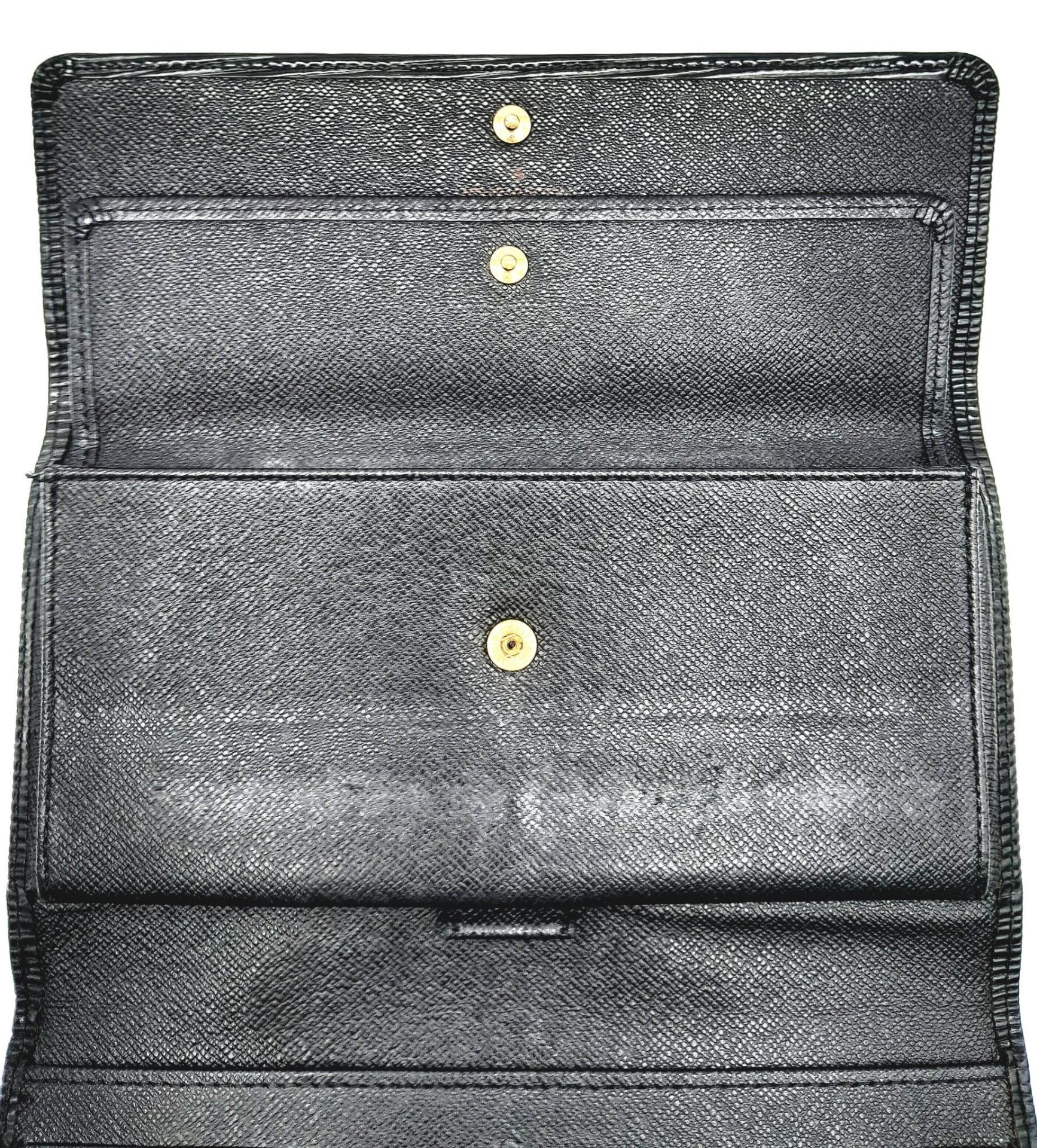 A Louis Vuitton Black 'Sarah' Wallet. Epi leather exterior with the LV logo and press stud - Image 5 of 8
