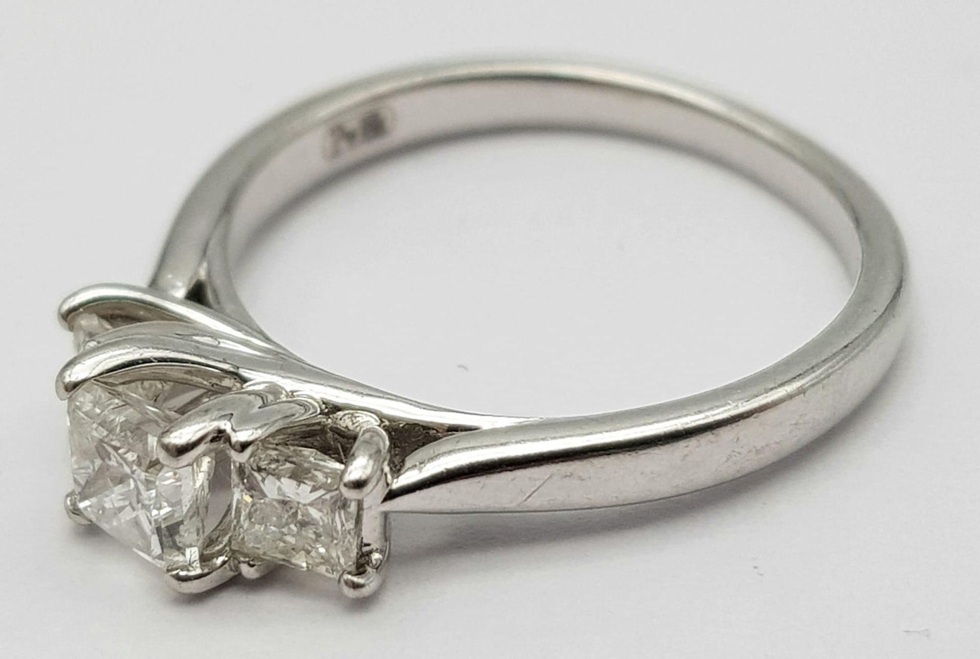 AN 18K WHITE GOLD TRILOGY PRINCESS CUT DIAMOND RING - 0.75CTW. 3.2G. SIZE K. - Image 4 of 6