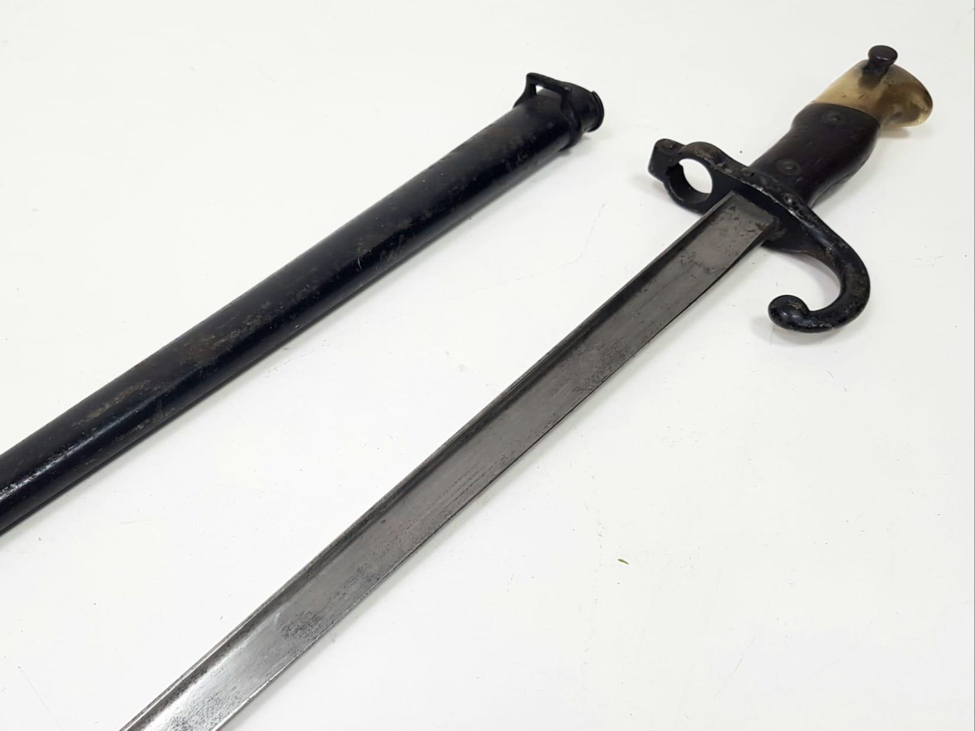 An 1873 French Bayonet. S and M Makers Mark. French inscription engraved to top of blade. Release - Image 4 of 11