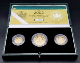 A Royal Mint 2002 Three Sovereign 22K Gold Proof Coin Set. This set features a double sovereign,