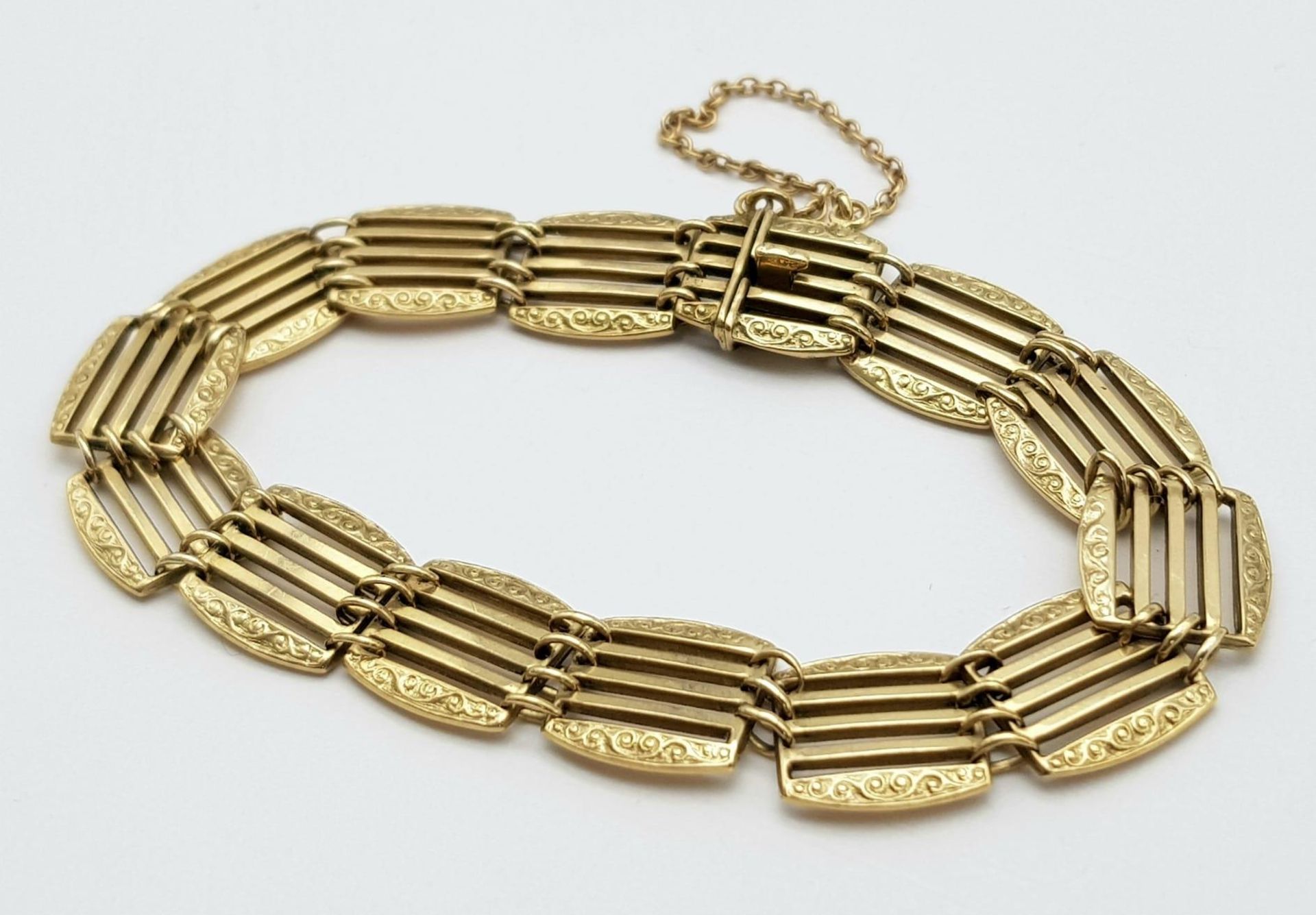 A 9K GOLD ORNATELY DECORATED GATE BRACELET . 11.1gms - Image 2 of 6