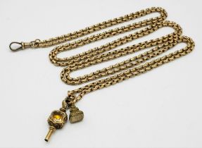 An Outstanding Antique 9k Rose Gold Albert Chain - With 9k gold onyx and citrine key and a 9k gold