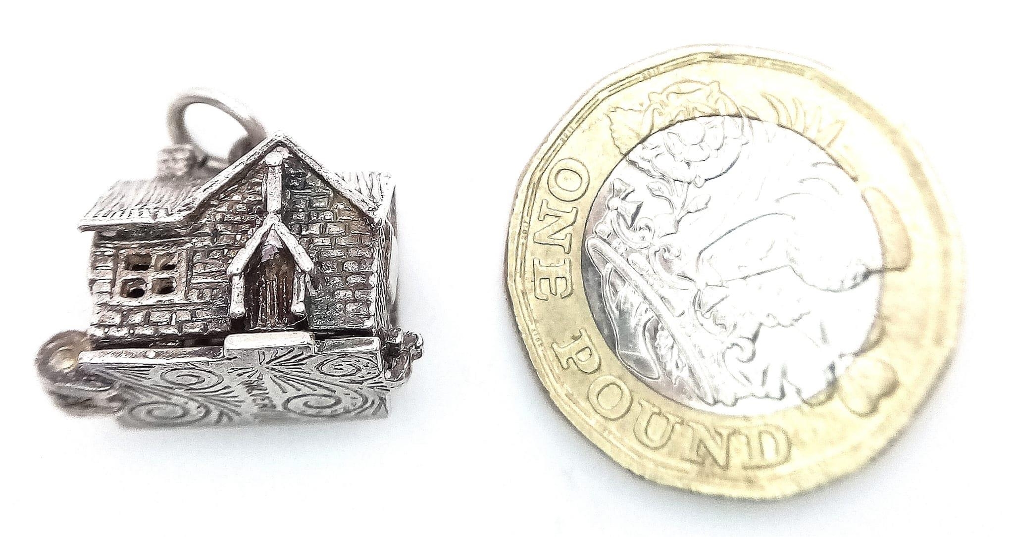 A Sterling Silver House Charm Which Opens. 1.8cm length, 5.7g total weight. Ref: SC 7094 - Image 2 of 9