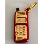 Vintage Italian 14 carat GOLD TELEPHONE CHARM with red enamel surround.1.03 grams.