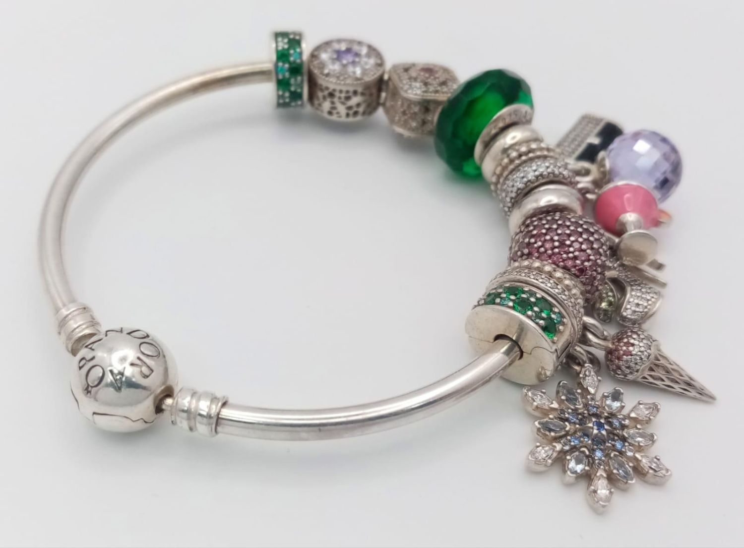 A very desirable ,sterling silver PANDORA bangle with thirteen charms, total weight: 45 g. - Image 5 of 12