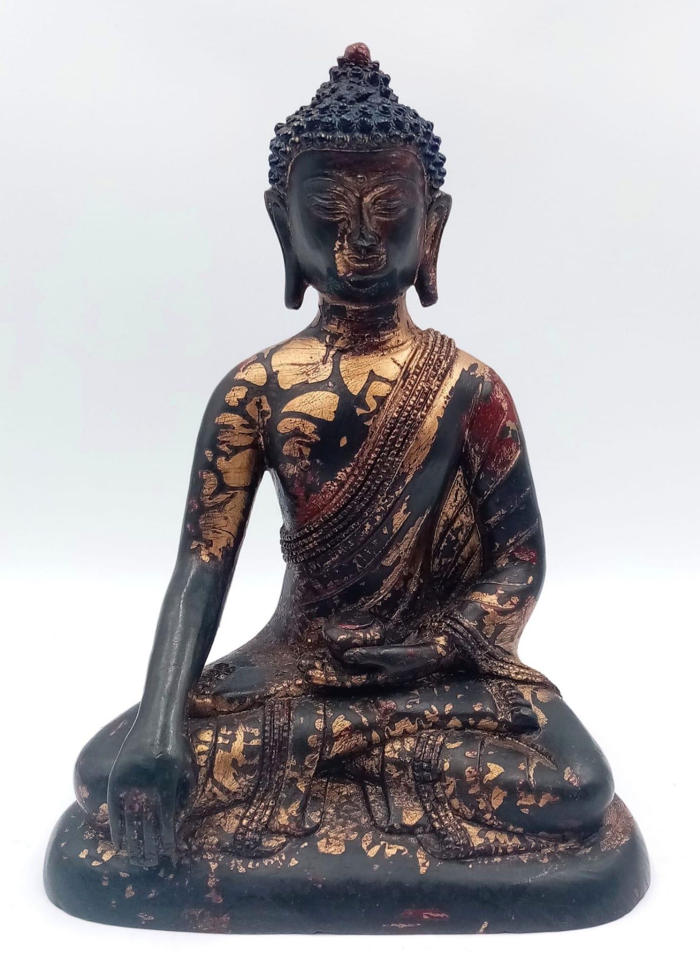 A Majestic Antique Chinese Seated Buddha Figure - Decorated with gilt and polychrome highlights.